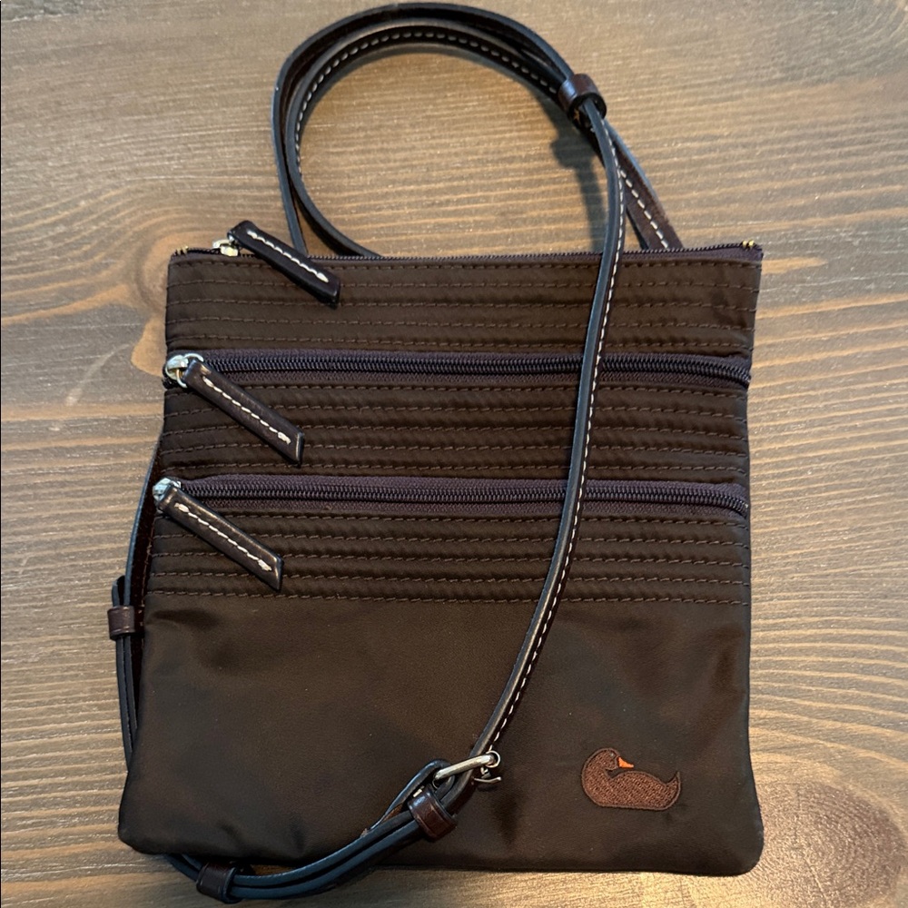 Dooney & Bourke  Compact Brown Crossbody Bag with Triple Zippers